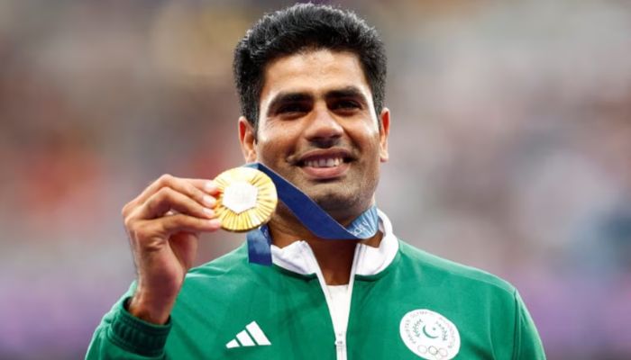 Pakistans javelin thrower posing with his Olympic gold medal at the Paris Olympics 2024 on August 9, 2024 at the Mens Javelin Throw Victory Ceremony in Stade de France, Saint-Denis, Paris, France. — Reuters