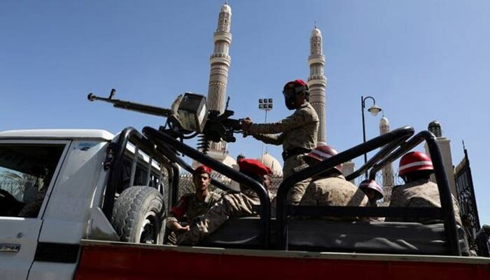 Representational image of a military policemen riding on the back of a patrol truck at the site of a funeral of Houthi fighters killed during recent fighting against government forces, in Sanaa, Yemen December 6, 2021.