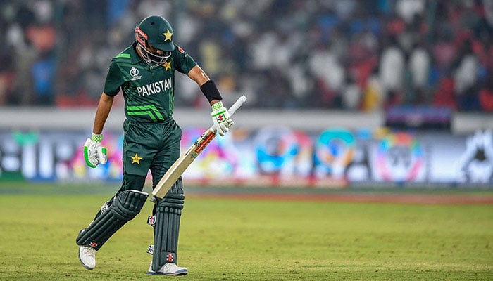 Babar Azam walks back to the pavilion after his dismissal during World Cup 2023 ODI match between Pakistan and Sri Lanka on October 10, 2023. — AFP