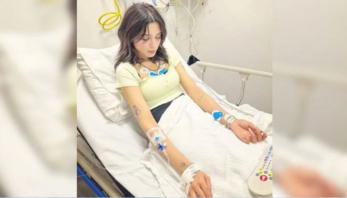 Aima Baig lying on a hospital bed as her health suffered some setbacks on August 14, 2024. — Instagram/@aima_baig_official