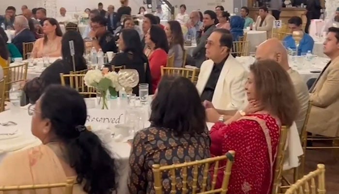 Audience can be seen at international exhibition of renowned poet Ghazala Habibs collection, Lamkaan in Dallas. — Geo News/Screengrab