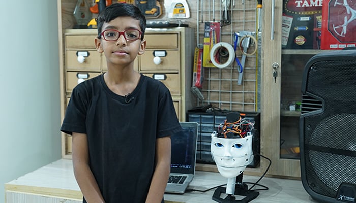 11-year-old Karachi boy Muhammad Hasnain demonstrates his AI-assistant robot. — Reporter