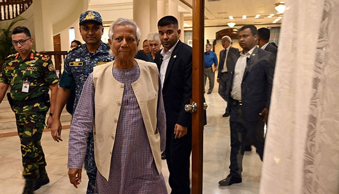 Head of Bangladeshs new interim government Muhammad Yunus arrives to meet relatives of people who went missing during the tenure of ousted prime minister Sheikh Hasina, in Dhaka on August 13, 2024. — AFP