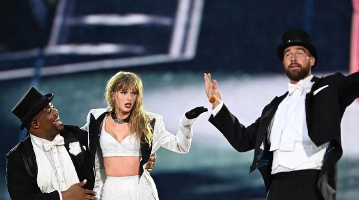 Travis Kelce shows support for Taylor Swift's dancer after he fell onstage