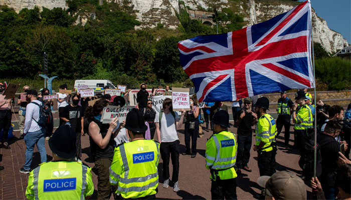 Police contain a small group of anti-immigration protesters as counter-protesters hold a rally in Dover, Britain, August 17, 2024. — Reuters