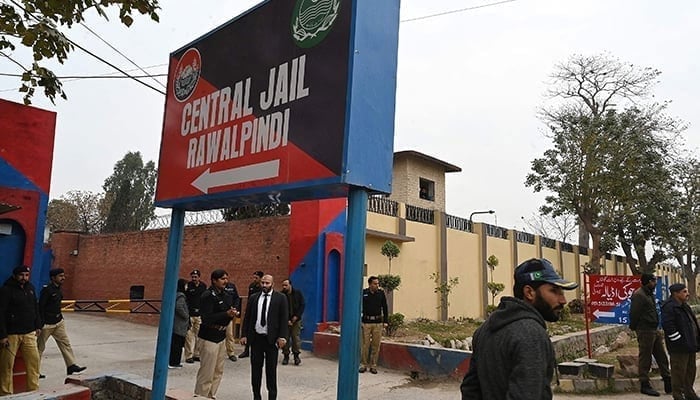 Police officers stand outside the entrance of Adiala Jail during a hearing of jailed former Prime Minister Imran Khan in Rawalpindi on January 30, 2024. — AFP