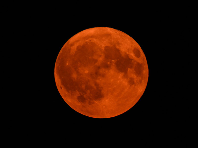 The super blue moon rises over the spiral tower of the former Gneisenau coal mine in Dortmund, western Germany, on August 19, 2024. — AFP