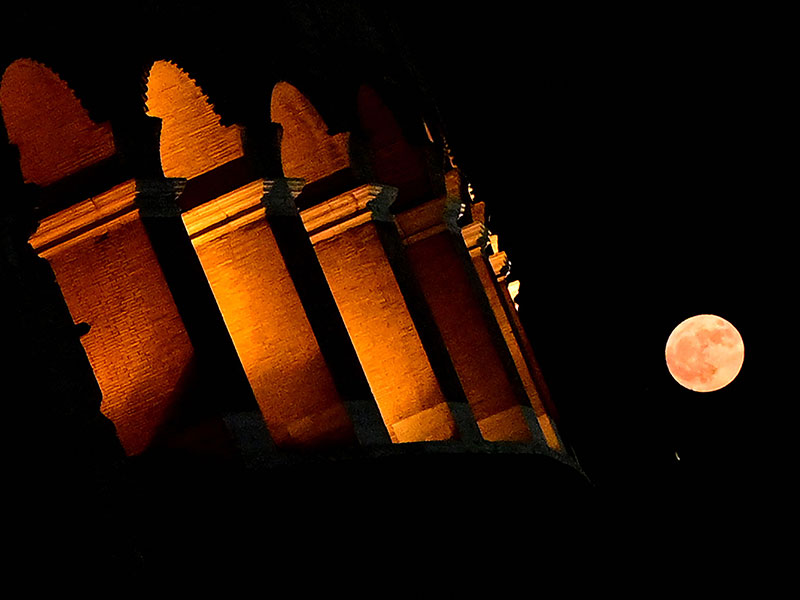 The Super Blue Moon rises near the Colosseum in Rome, on August 19, 2024. — AFP