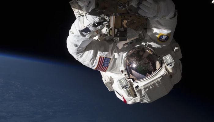 Nasa Expedition 35 Flight Engineers Chris Cassidy (pictured) and Tom Marshburn (out of frame) conduct a spacewalk to inspect and replace a pump controller box on the International Space Stations (ISS) far port truss (P6) leaking ammonia coolant on May 11, 2013. — Reuters