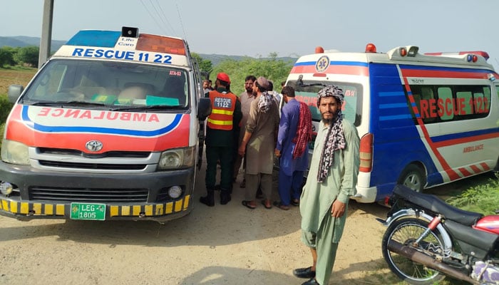 Rescue 1122 vehicles at the site of the attack in Attock on August 22, 2024. — Reporter