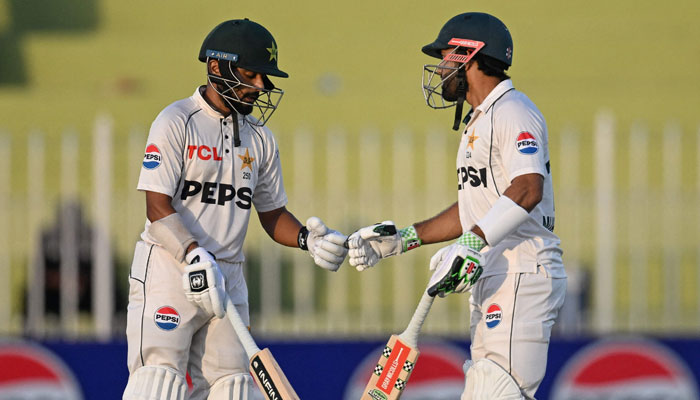 Pakistans Saud Shakeel (left) and Mohammad Rizwan pictured during the Test cricket match between Pakistan and Bangladesh at the Rawalpindi Cricket Stadium on August 21, 2024. — AFP