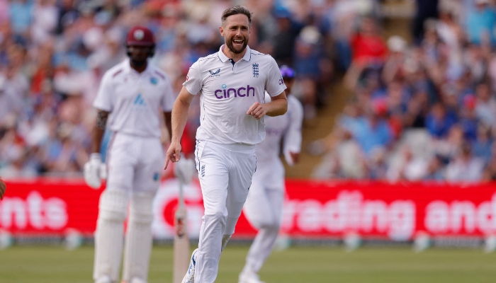 Englands Chris Woakes celebrates after taking the wicket of West Indies Kraigg Brathwaite at the Cricket Ground in Birmingham, Britain, on July 27, 2024. —Reuters