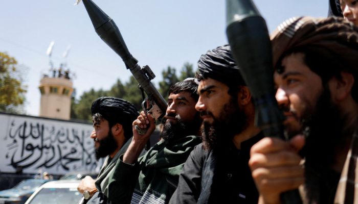 Taliban fighters celebrate on the second anniversary of the fall of Kabul on a street near the US embassy in Kabul, Afghanistan on August 15, 2023. — Reuters