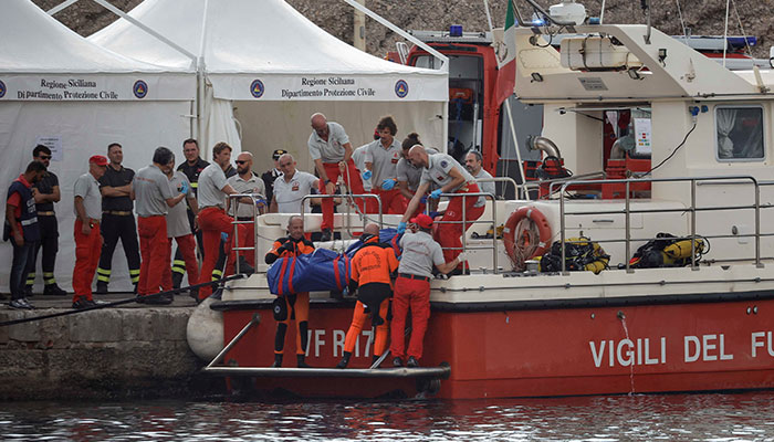 Rescue personnel lift the body bag containing the corpse of British entrepreneur Mike Lynch, who died when a yacht owned by his family sank off the coast of Porticello, near the Sicilian city of Palermo, Italy, August 22, 2024. — Reuters