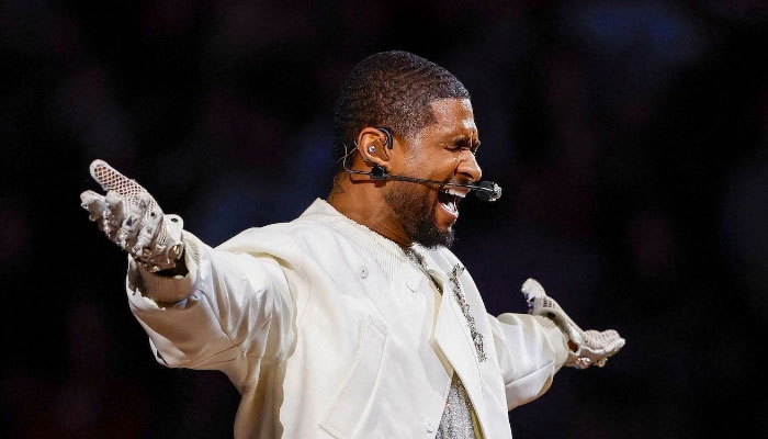 Usher rocks Washington DC stage after neck injury, Baltimore next