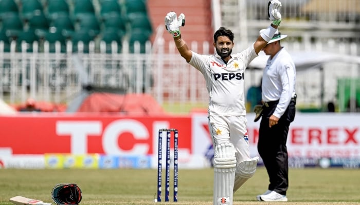 Mohammad Rizwan celebrates after scoring a century during the second day of the first Test cricket match between Pakistan and Bangladesh at the Rawalpindi Cricket Stadium in Rawalpindi on August 22, 2024. —AFP