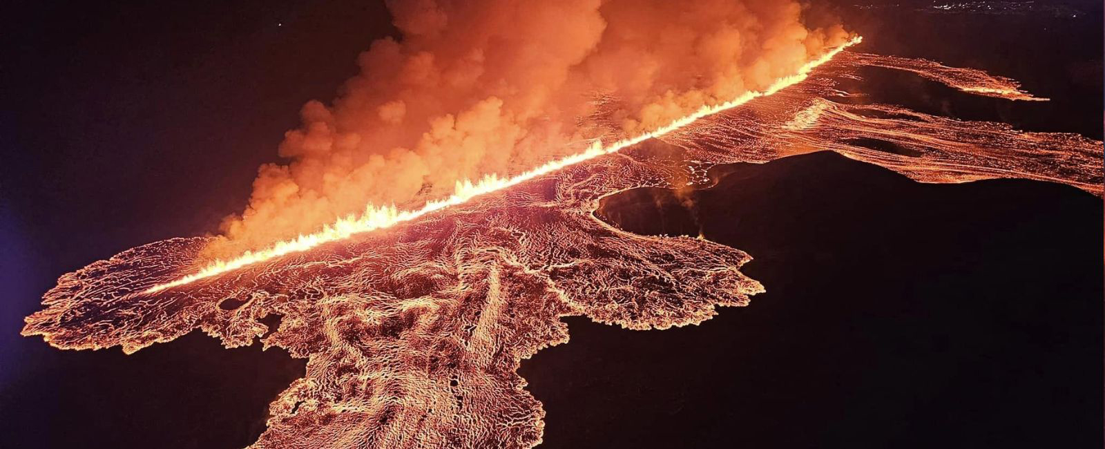 Lava is seen spreading near Grindavik on Iceland's Reykjanes peninsula after a volcanic eruption in the region on August 23, 2024. — AFP