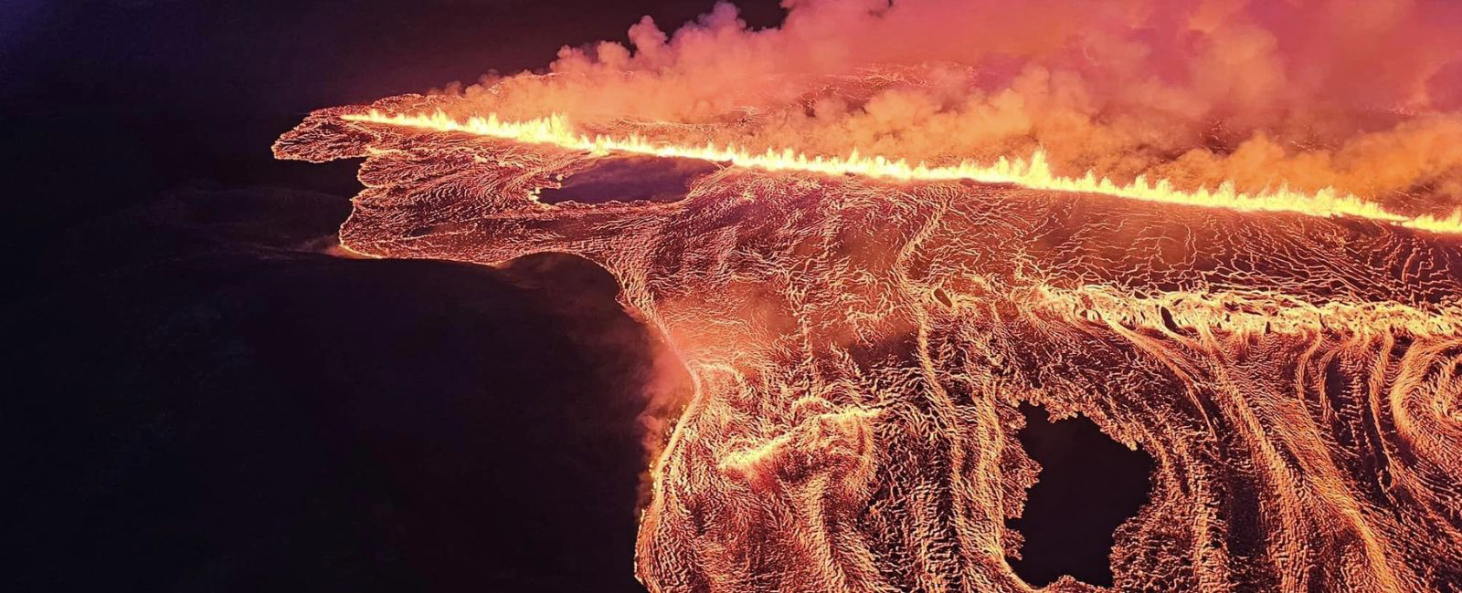 Picture released by the Public Defense Department of the State Police in Iceland and taken during the night from August 22 to 23, 2024 shows lava and smoke erupting from a volcano near Grindavik on the Icelandic peninsula of Reykjanes.— AFP