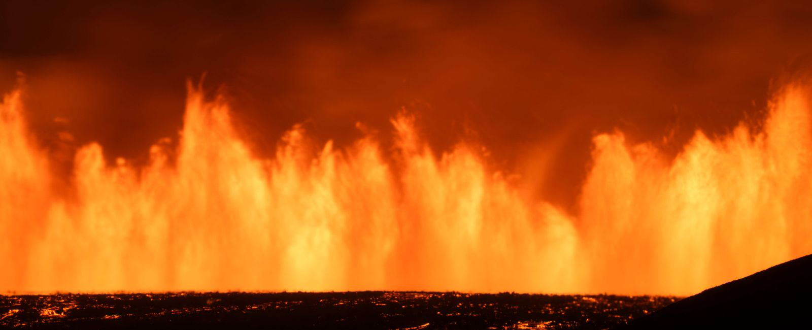 Flames erupting from the lava after the volcanic eruption near Grindavik on the Icelandic peninsula of Reykjanes on August 23, 2024. — AFP