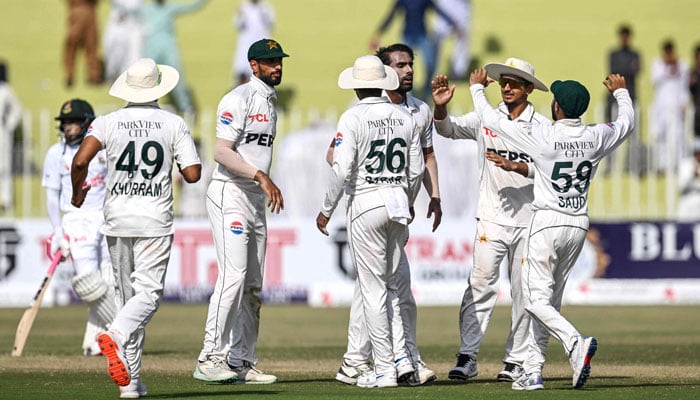 Pakistans players celebrate after the dismissal of Bangladeshs Shadman Islam during the third day of the first Test cricket match between Pakistan and Bangladesh at the Rawalpindi Cricket Stadium in Rawalpindi on August 23, 2024. — AFP