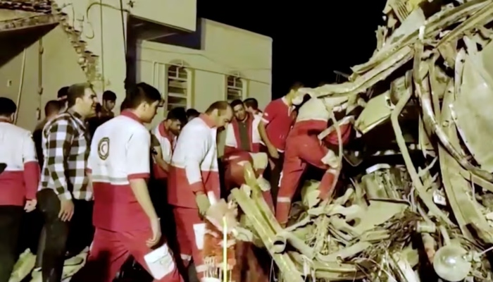 Rescuers work at the scene of a bus accident at Yazd province, Iran, in this still image taken from a video, August 21, 2024. — Reuters