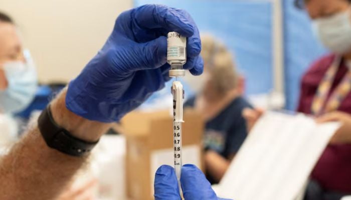 Volunteer pharmacist fills a syringe with a dose of the jynneos smallpox and monkeypox vaccine during a clinic through the Pima County Department of Public Health at Abrams Public Health Center in Tucson, Arizona, US on August 20, 2022. — Reuters