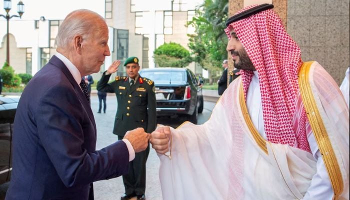 US President Joe Biden (L) fist bumps Saudi Crown Prince Mohammed bin Salman upon his arrival at Al Salman Palace, in Jeddah, Saudi Arabia on July 15, 2022. — Reuters