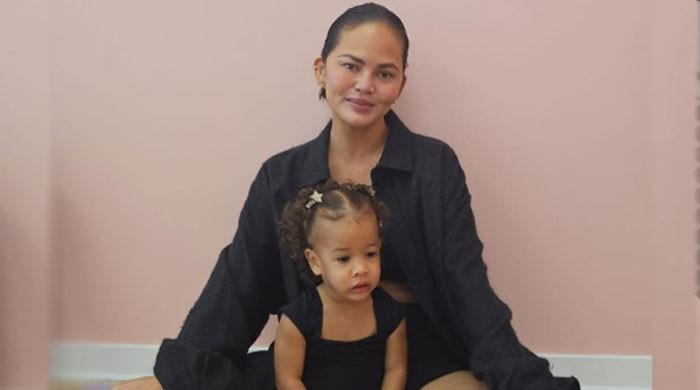 Chrissy Teigen shares adorable photos of daughter Esti: â€ ̃Too shy to dance'