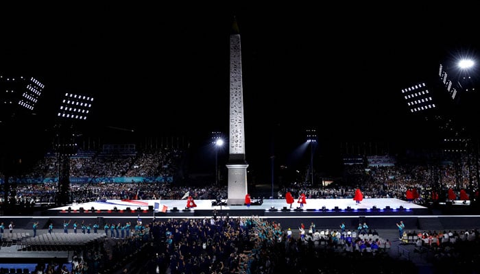 General view of athletes of France during the opening ceremony as the Obelisk of Luxor on the Place de la Concorde is seen on August 28, 2024. —Reuters