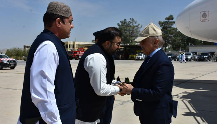 PM Shehbaz Sharif (right) is greeted by Balochistan CM Sarfaraz Bugti as he lands in Quetta on a one-day visit to review security situation in province on August 29, 2024. — Facebook/@DprGoB