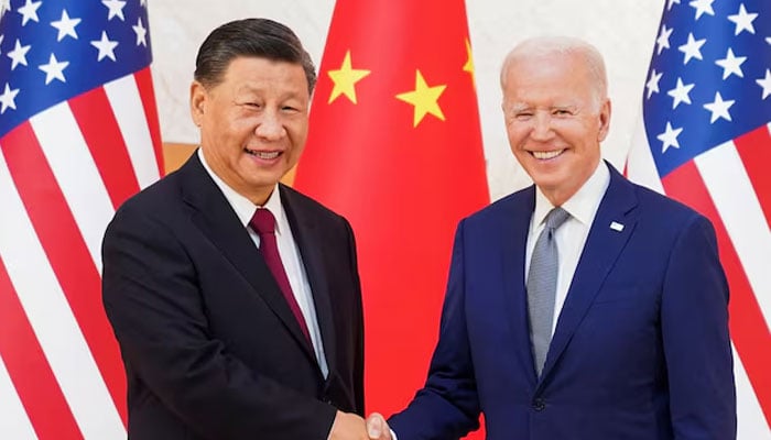 US President Joe Biden shakes hands with Chinese President Xi Jinping as they meet on the sidelines of the G20 leaders summit in Bali, Indonesia, November 14, 2022. — Reuters