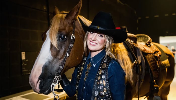 Lainey Wilson and Cowboy at the tribute concert