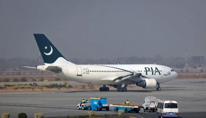 A Pakistan International Airlines (PIA) plane prepares to take-off at Allama Iqbal International Airport in Lahore. — Reuters/Files