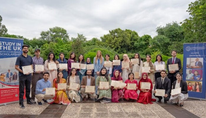 Pakistani students pictured along with British High Commissioner Jane Marriott. — APP via British High Commission