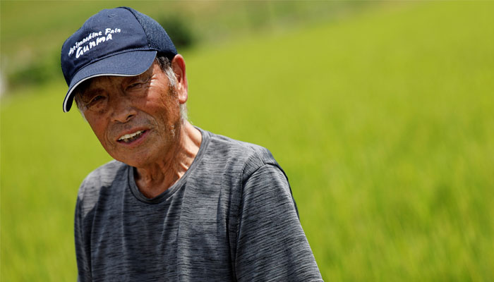 An elderly farmer seen at his paddy fields in Meiwa, Gunma prefecture, Japan,on August 7, 2024. — Reuters