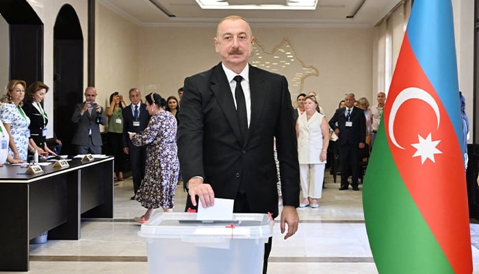 Azeri President Ilham Aliyev casts a ballot at a polling station during parliamentary elections in Baku, Azerbaijan on September 1, 2024. — Reuters