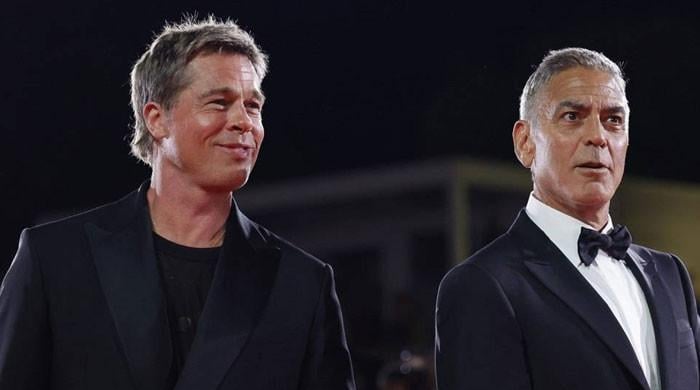 Brad Pitt, George Clooney react to standing ovation for ‘Wolfs’