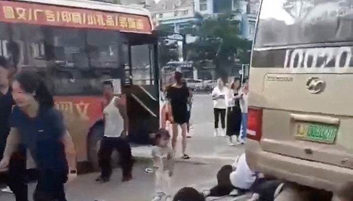 Commotion outside the school as bus ploughs into people, kills 11 and injures more than two dozens in Dongping County, Shangdong province, China on September 3, 2024. — Reuters