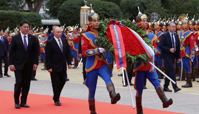 Russian President Vladimir Putin and Mongolian President Ukhnaagiin Khurelsukh attend a wreath-laying ceremony at the monument to Soviet marshal Georgy Zhukov in Ulaanbaatar, Mongolia September 3, 2024. — Reuters