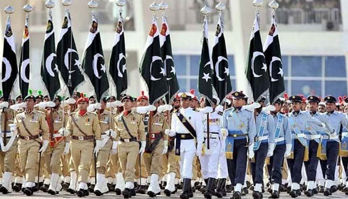 Contingents of Pakistan Army, Navy, Pakistan Air Force march past the dais presenting salute to the chief guest at the Parade Avenue in Islamabad. — Radio Pakistan/File