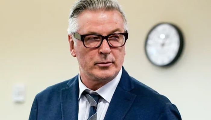 Alec Baldwin back at father duties after Rust case reopens