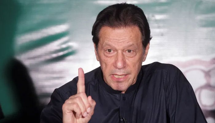 Former prime minister Imran Khan gestures as he speaks to journalists at his residence in Lahore, May 18, 2023. — Reuters