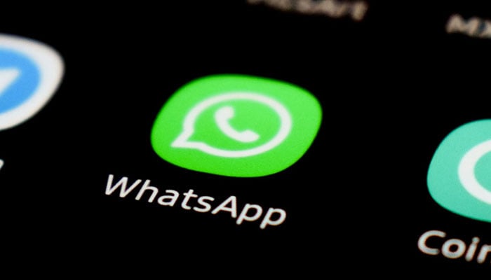 A representational image showing the WhatsApp app icon displayed on a phone screen. — Unsplash