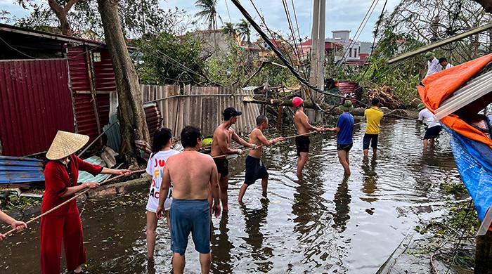 Typhoon Yagi weakens after killing 14 in Vietnam