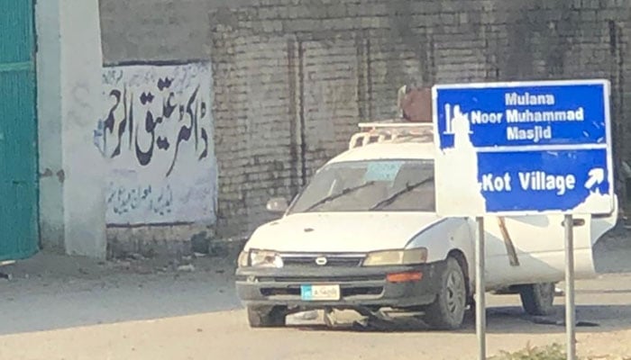 A view of the attacked vehicle in South Waziristan. — Photo by reporter