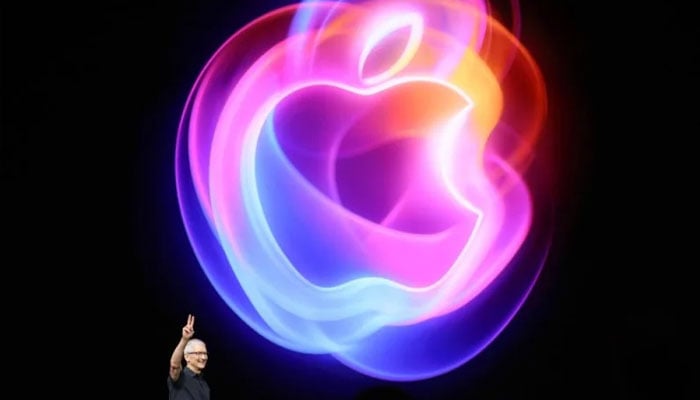 Apples CEO Tim Cook gestures during an Apple event at the Apple Headquarters on September 9, 2024. — AFP