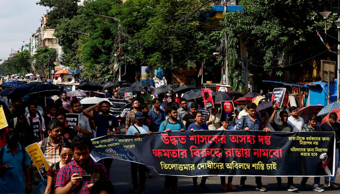 Medics march along a street during a protest condemning the rape and murder of a trainee medic at a government-run hospital, in Kolkata, India, August 28, 2024. — Reuters