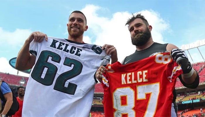 Travis Kelce roasts brother Jason for trying to fit in small shirt