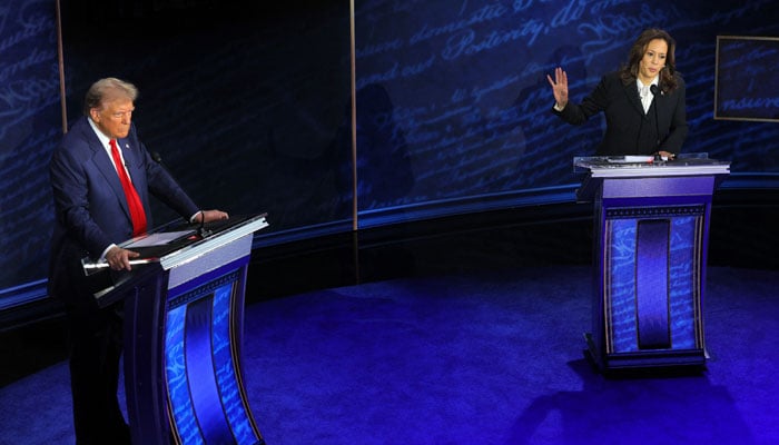 Democratic presidential nominee, US Vice President Kamala Harris speaks during a presidential debate hosted by ABC as Republican presidential nominee, former US President Donald Trump listens, in Philadelphia, Pennsylvania, US, September 10, 2024. — Reuters