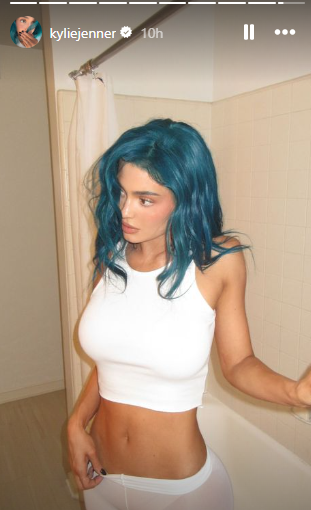 Kylie Jenner flaunts her blue hair while posing for portraits